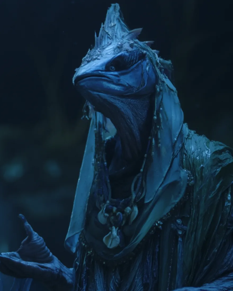 An Aieko at the water by moonlight, iridescent blue where its kin are gray black, veiled and hung with shell.