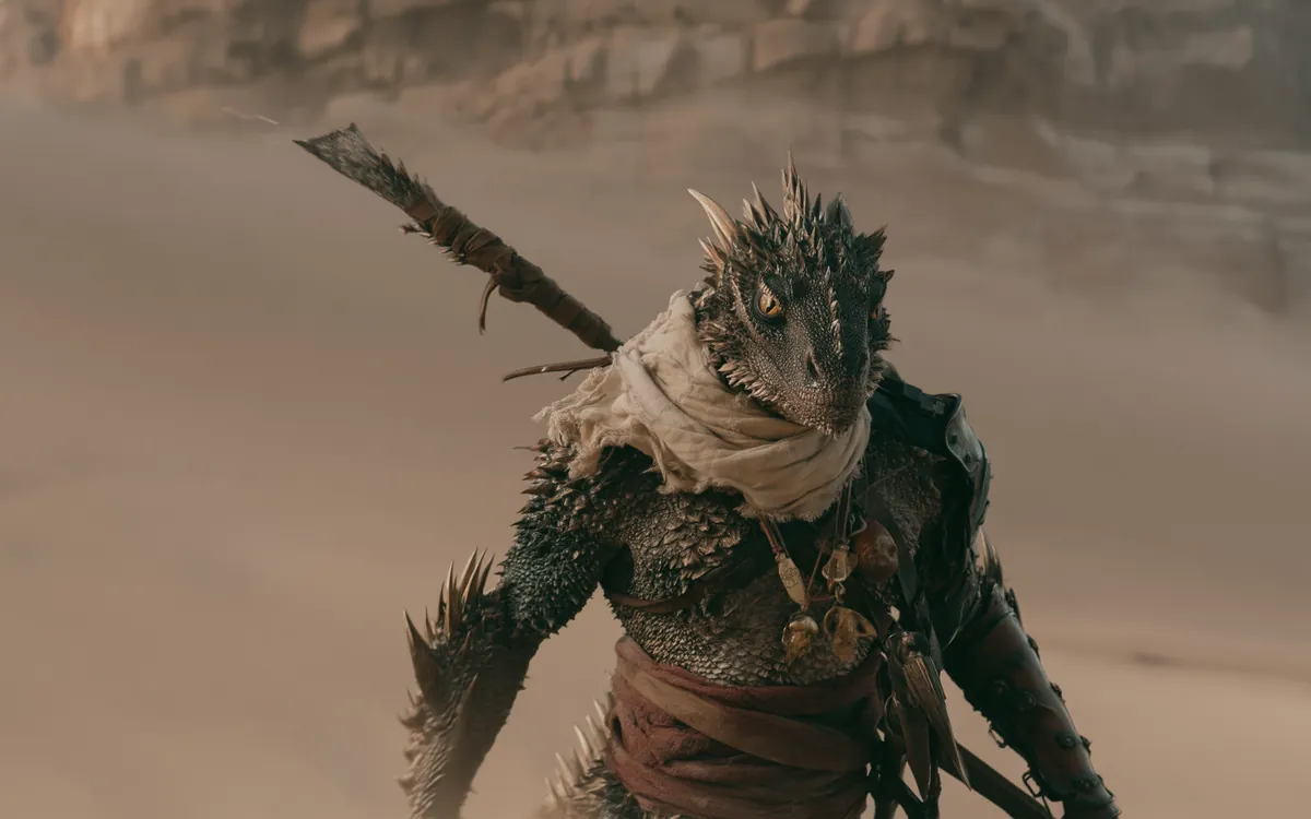 Hot wasteland in a dust wind, cracked ground and bare cliffs, with one of the blade scaled walking it.