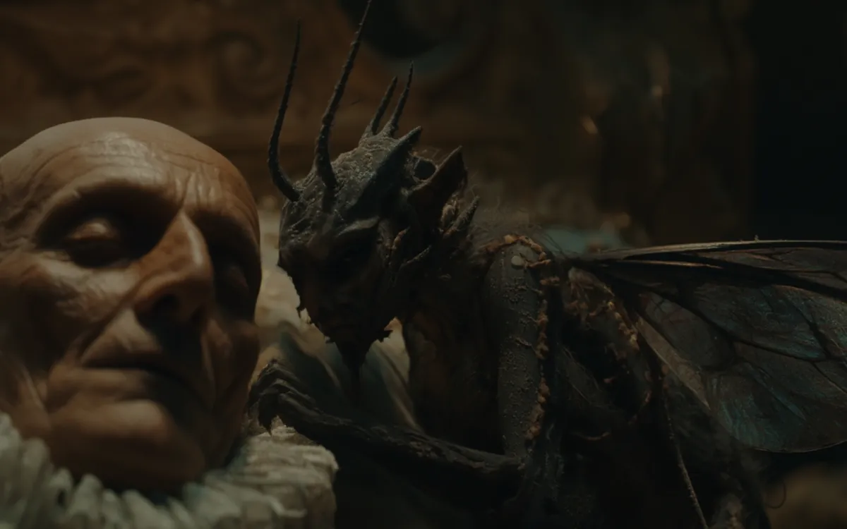 A Papill at the ear of a sleeping lord in a hall it was not invited into, come for nothing but the mischief of it.